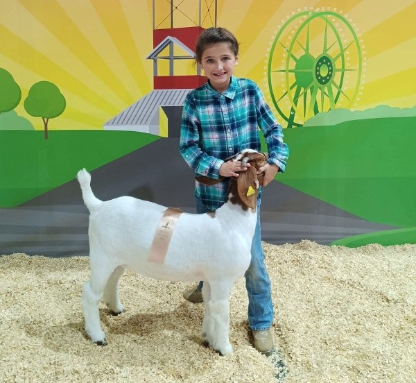 Dixie Pruett with her favorite goat